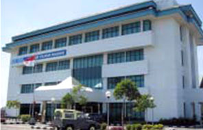The exterior view of an equipment maintenance facility outside a telephone office